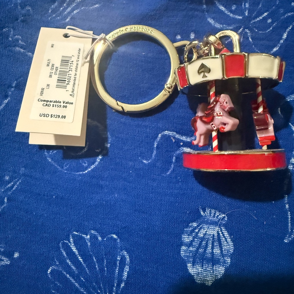 Kate Spade retired, merry-go-round purse charm rare substantial NWT Enchanting